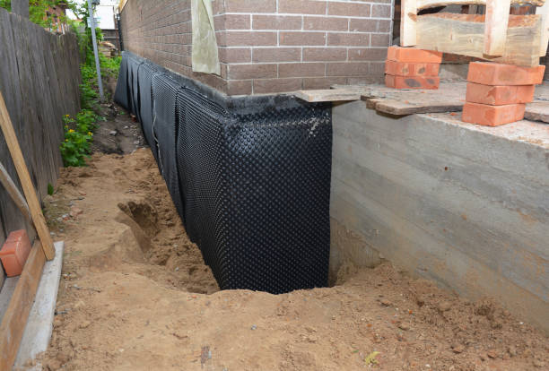Happy homeowners after waterproofing job in Waretown